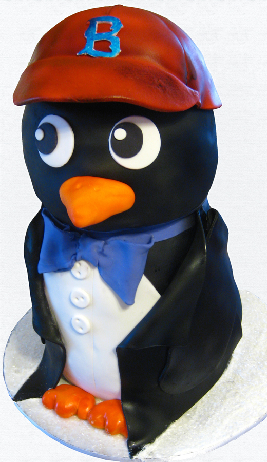 Sculpted penguin cake with Red Sox hat