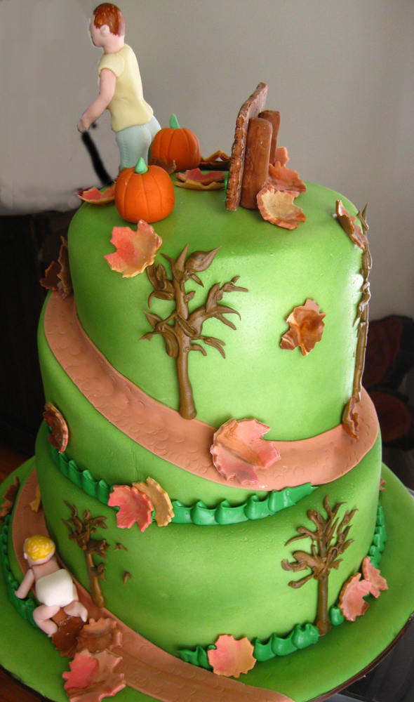 Father and son hill with fall leaves cake