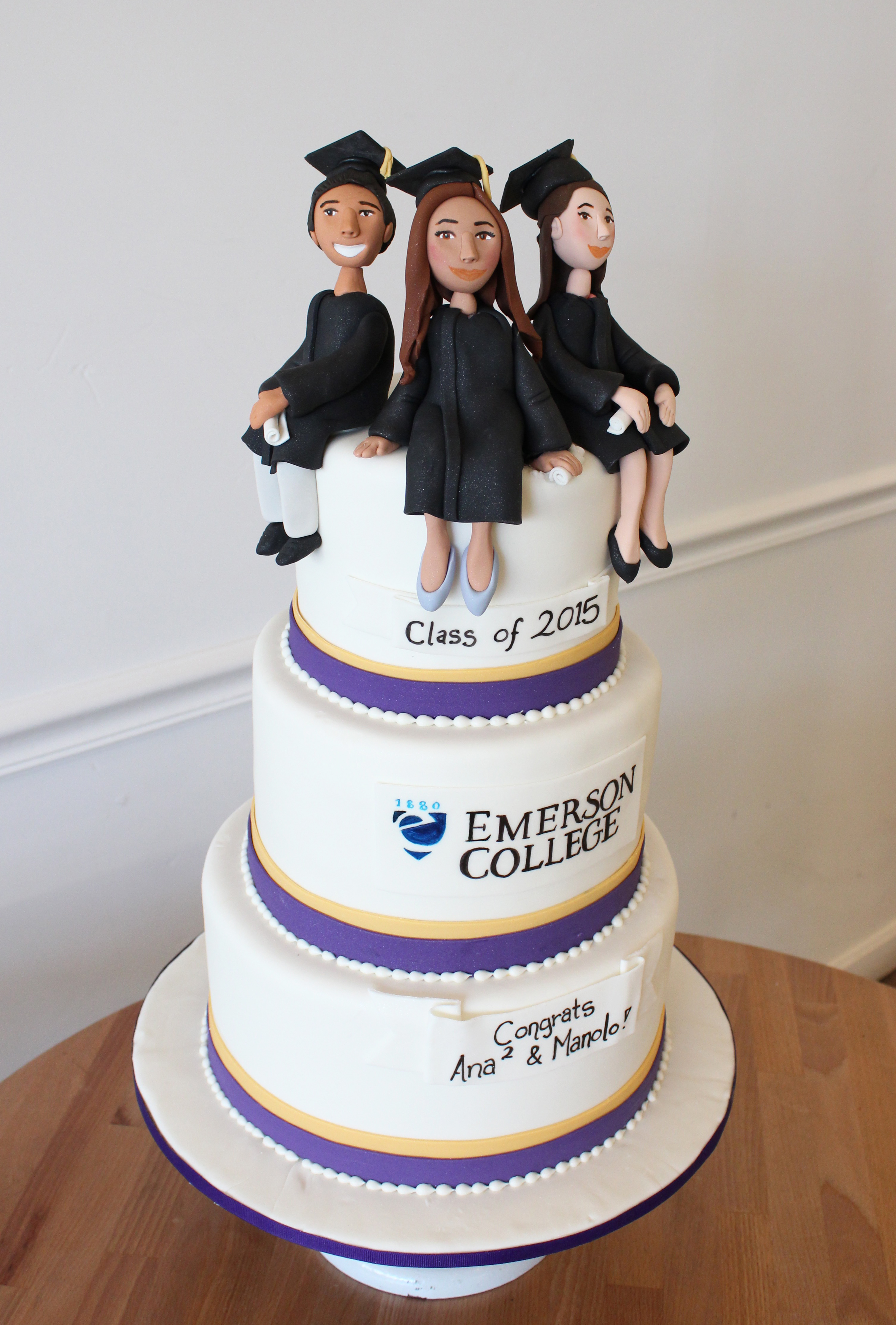 graduation cap and gown graduates cake